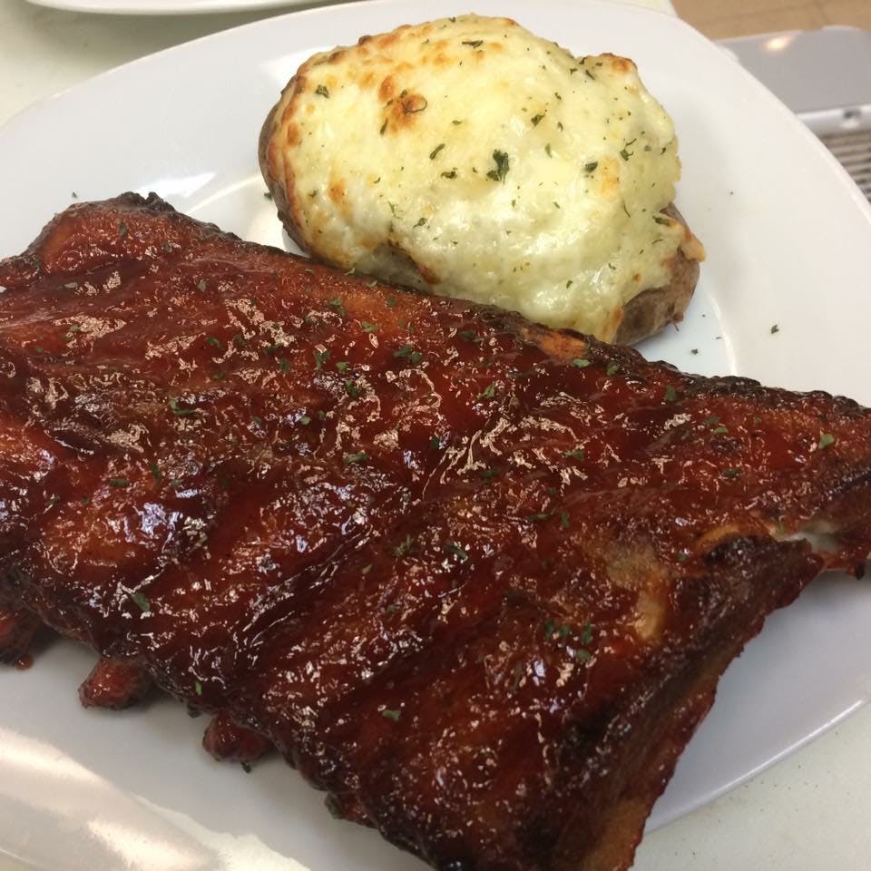 Order BBQ Baby Back Ribs - BBQ Baby Back Ribs 1/2 Slab food online from Pizza Mia store, Grand Blanc on bringmethat.com