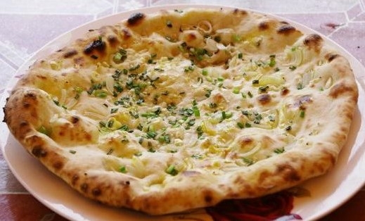 Order Onion Kulcha food online from India Oven store, Roseville on bringmethat.com