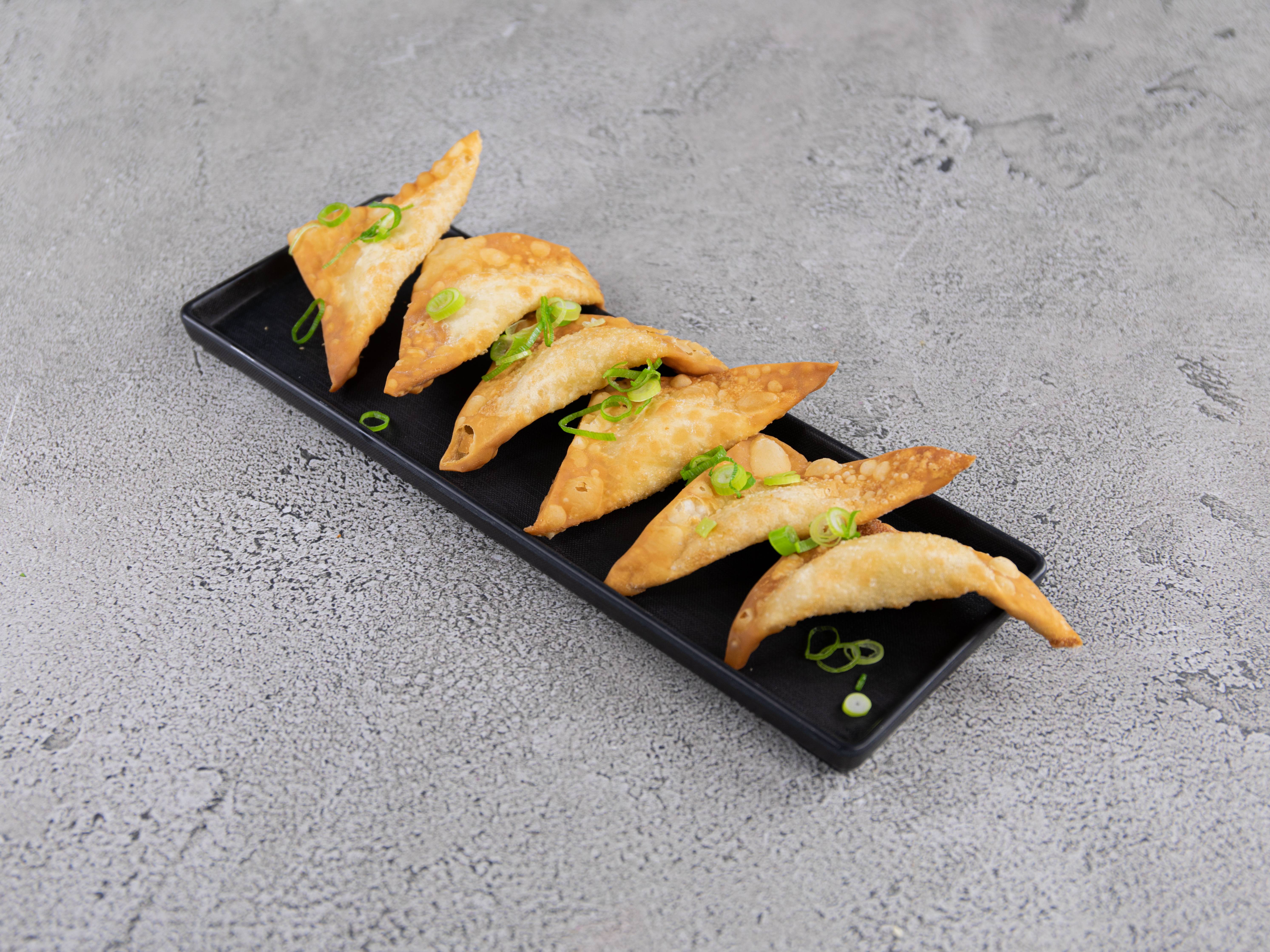 Order 8 Pieces Crab Rangoon food online from House of Chang store, Cambridge on bringmethat.com