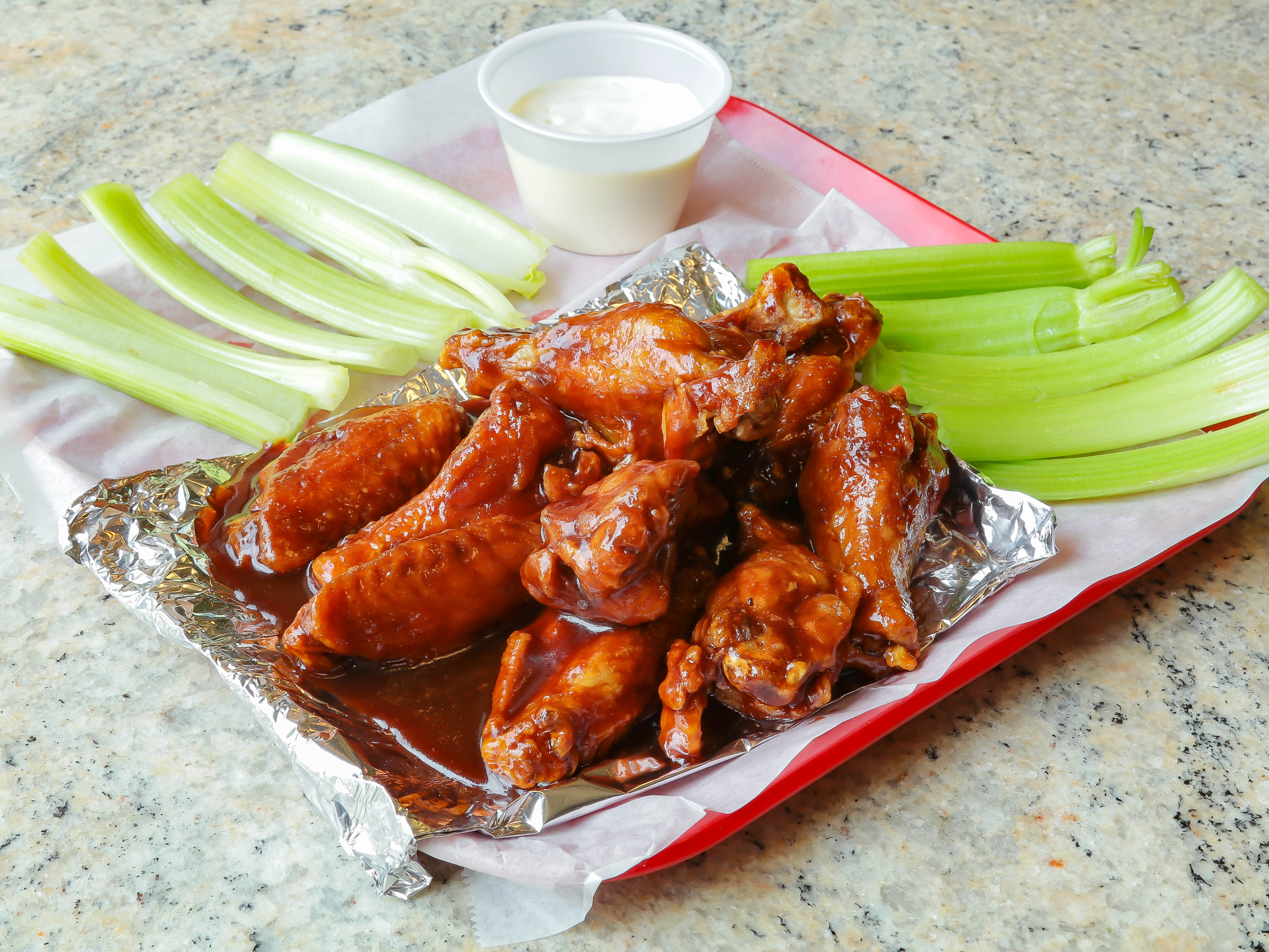 Order Fresh Party Wings food online from Toto's Pizzeria store, Philadelphia on bringmethat.com