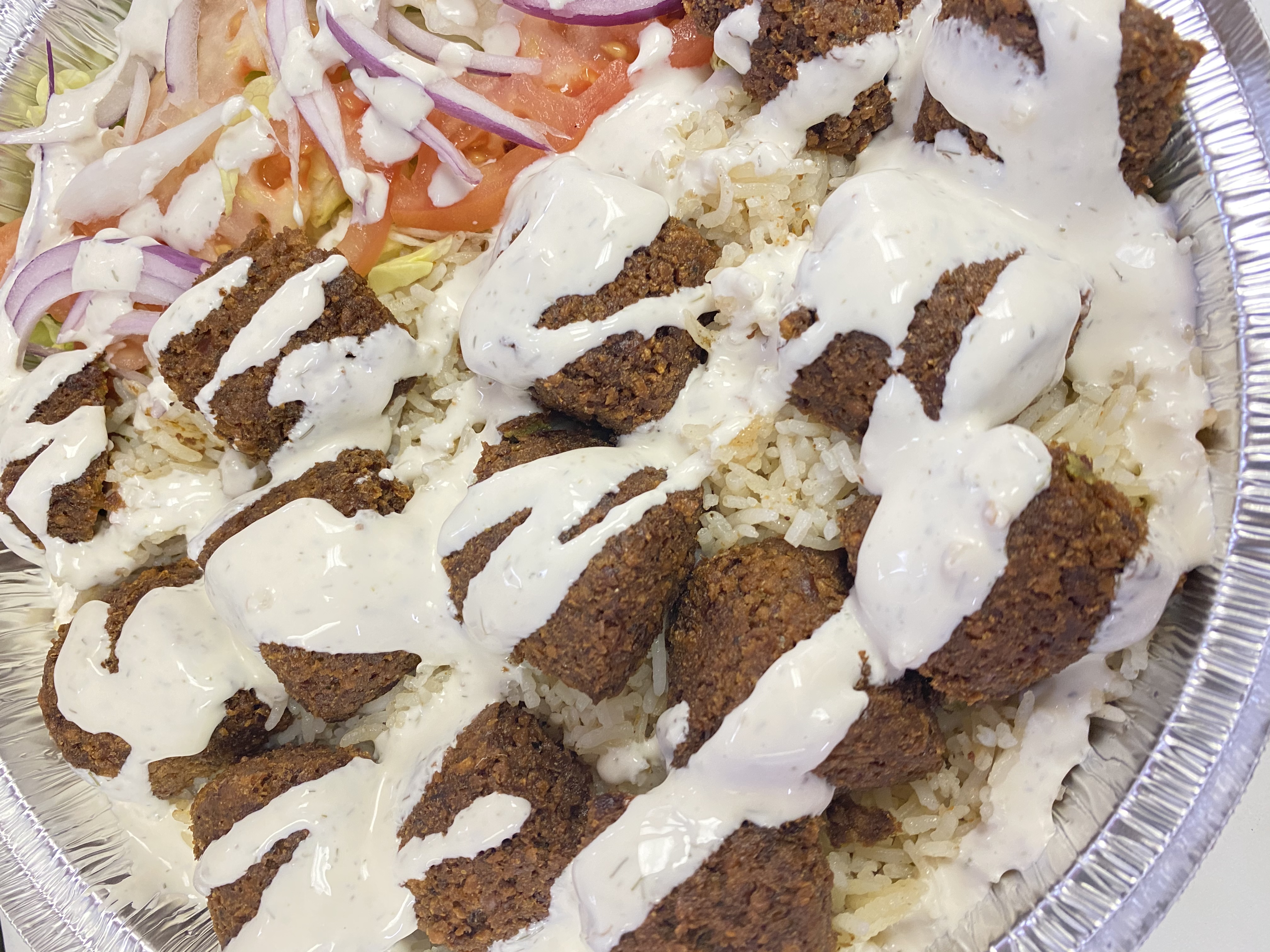 Order Falafel Dinner food online from Tuscan Pizza Crust store, Buffalo on bringmethat.com