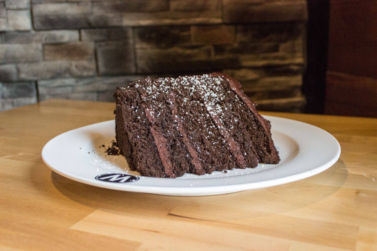 Order Towering Chocolate Cake food online from Wissota Chophouse Stevens Point Wi store, Stevens Point on bringmethat.com