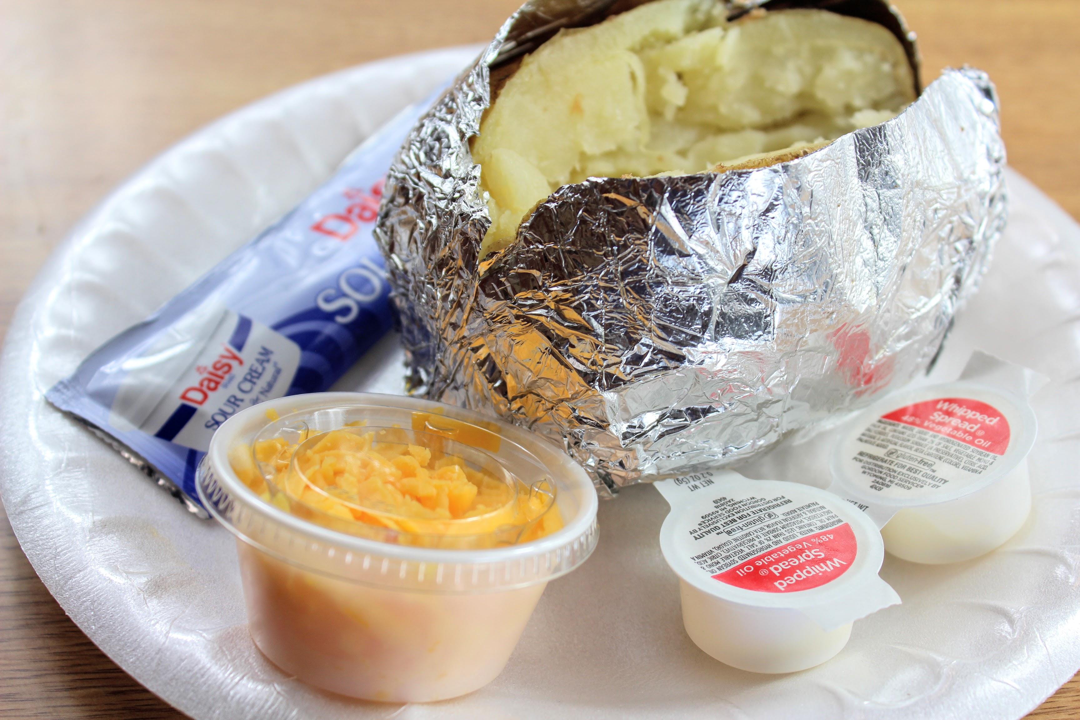 Order Plain Baked Potato food online from Mckenzie's Barbeque store, Conroe on bringmethat.com