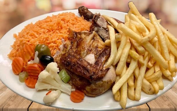 Order Half BBQ Chicken with French Fries and Rice food online from Baliza store, Kearny on bringmethat.com