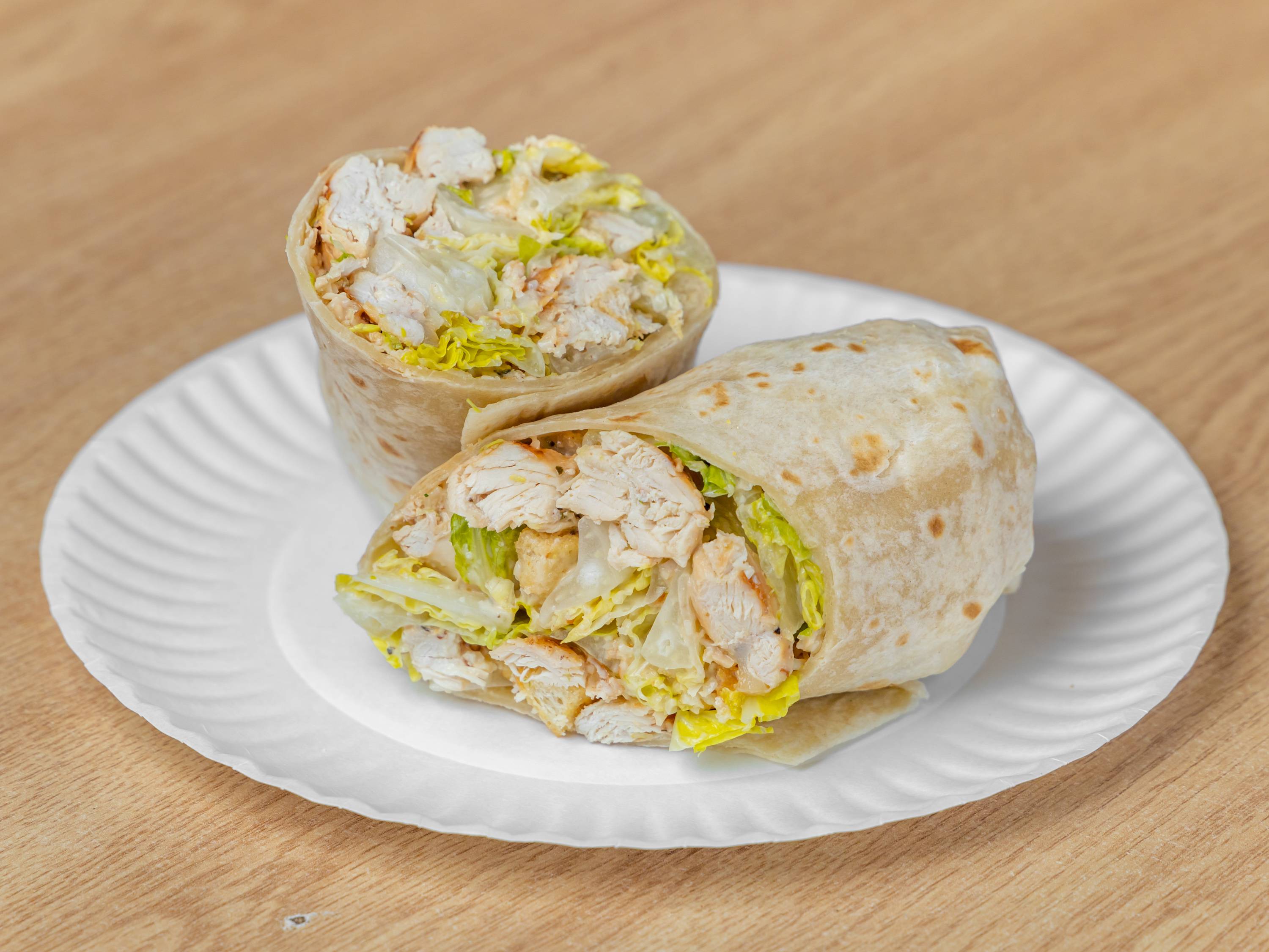 Order Chicken Caesar Wrap food online from All Star Pizza & Grill store, Lawrence on bringmethat.com