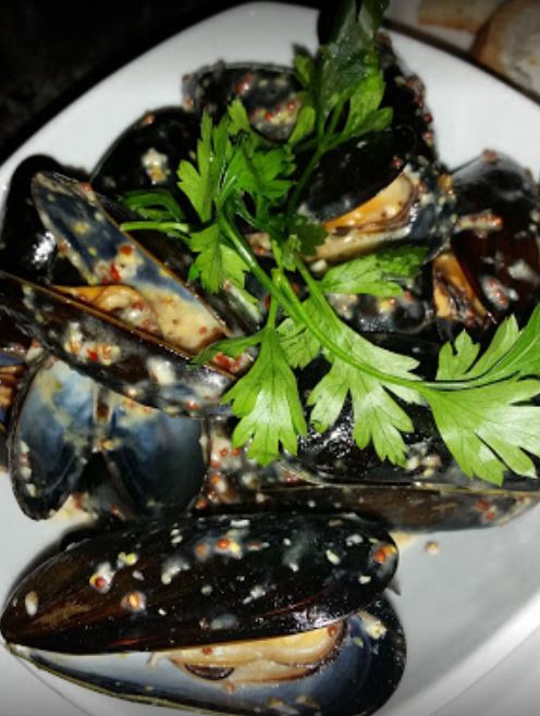 Order  Mussels Krasata  food online from Zestys store, Philadelphia on bringmethat.com