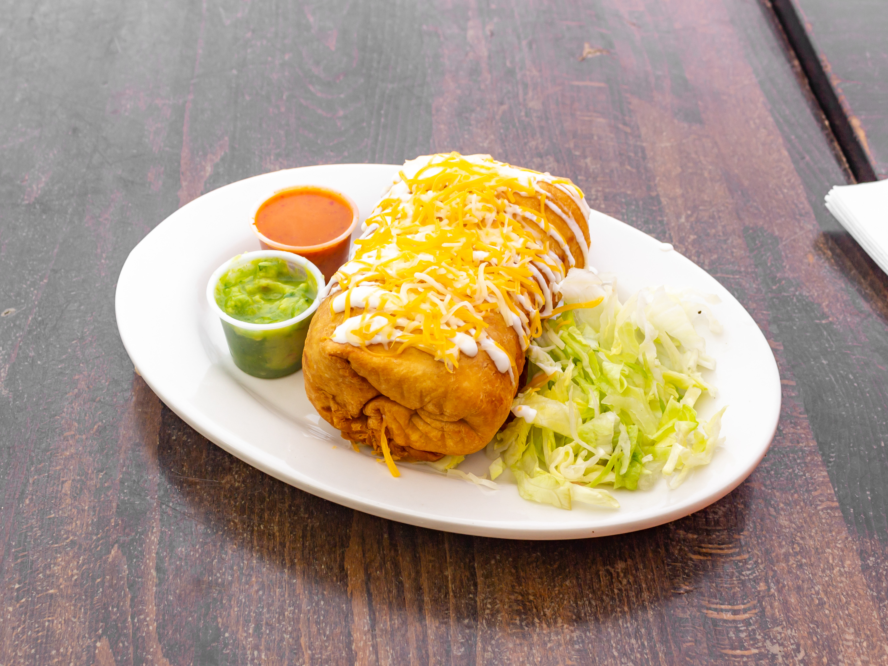 Order Pollo Chimichanga food online from Chinelos II store, New York on bringmethat.com