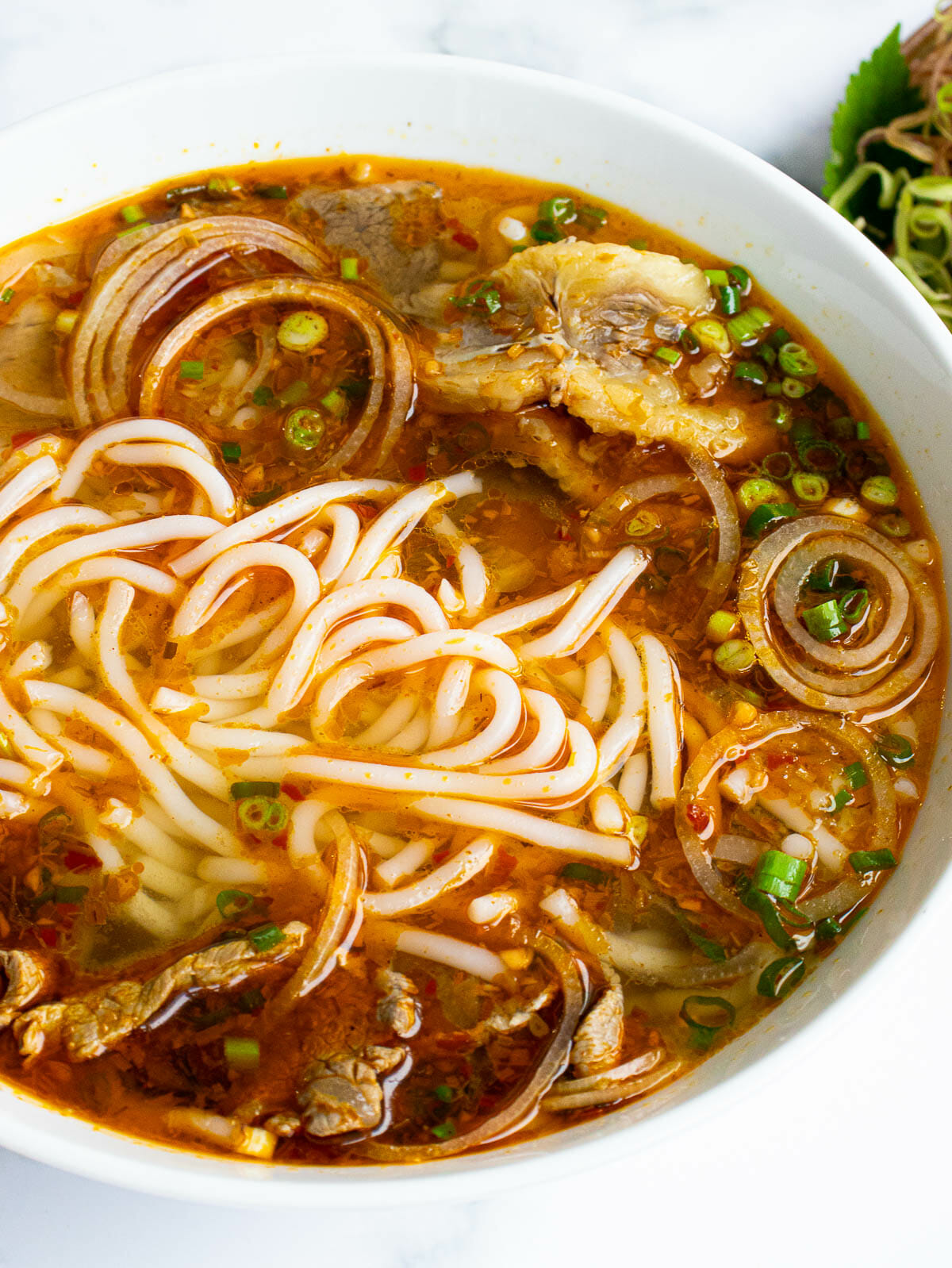 Order Bun Bo Hue food online from Pho And Cafe Anh Hong store, Upper Darby on bringmethat.com