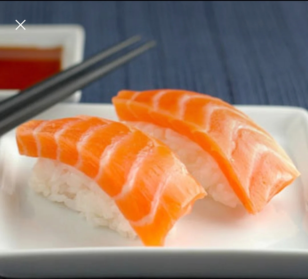 Order Salmon Nigiri  food online from Taki Japanese Steakhouse store, Atlanta on bringmethat.com