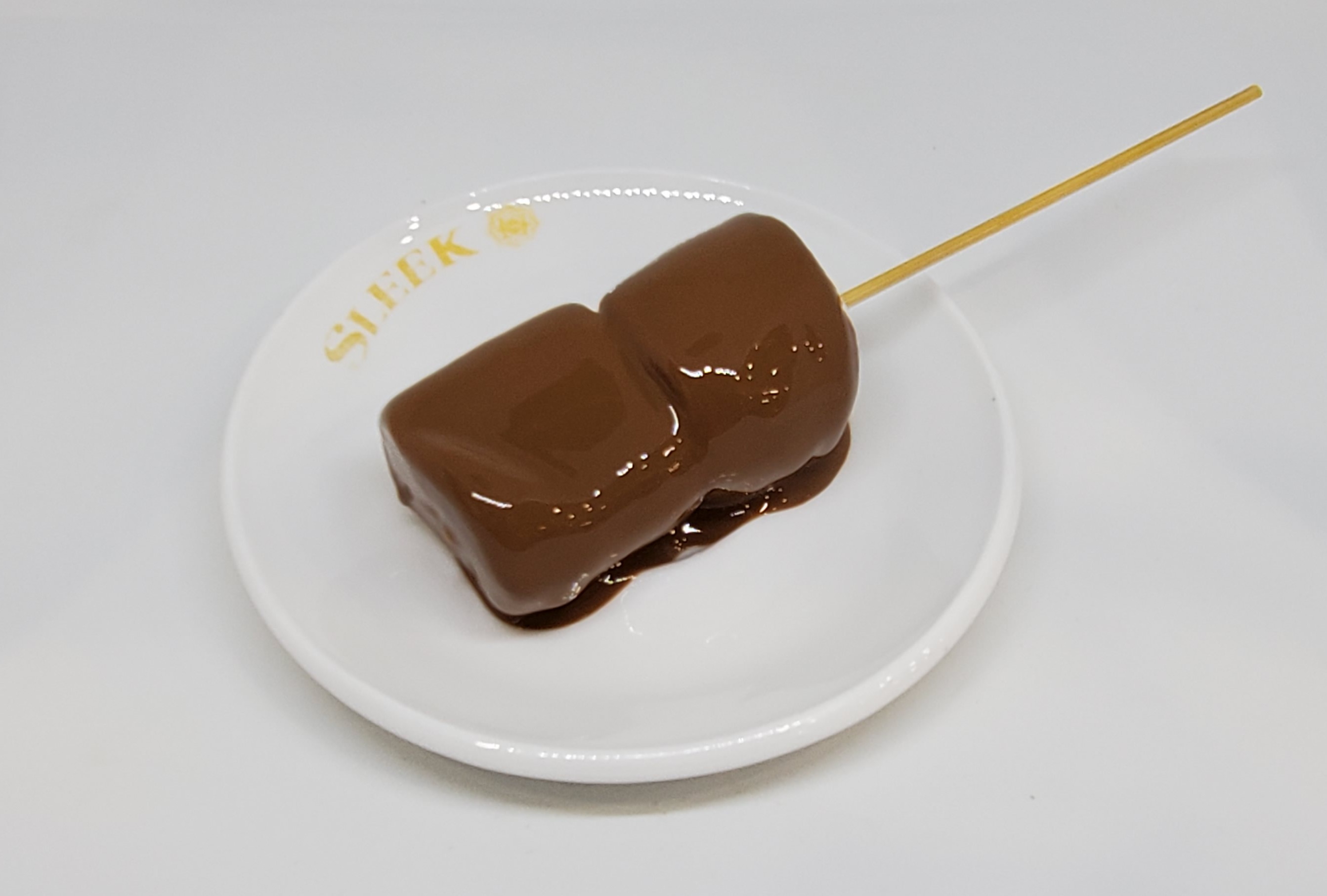 Order Marshmallow Stick food online from Sleek Creperie Cafe store, Cypress on bringmethat.com