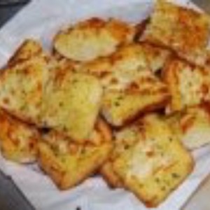 Order Garlic Bread with Cheese food online from Uncle Sams store, Peoria on bringmethat.com