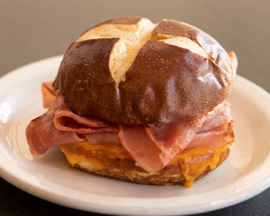 Order Pretzel Bun Sandwich - Ham & Cheese food online from Sweetwaters store, Newark on bringmethat.com