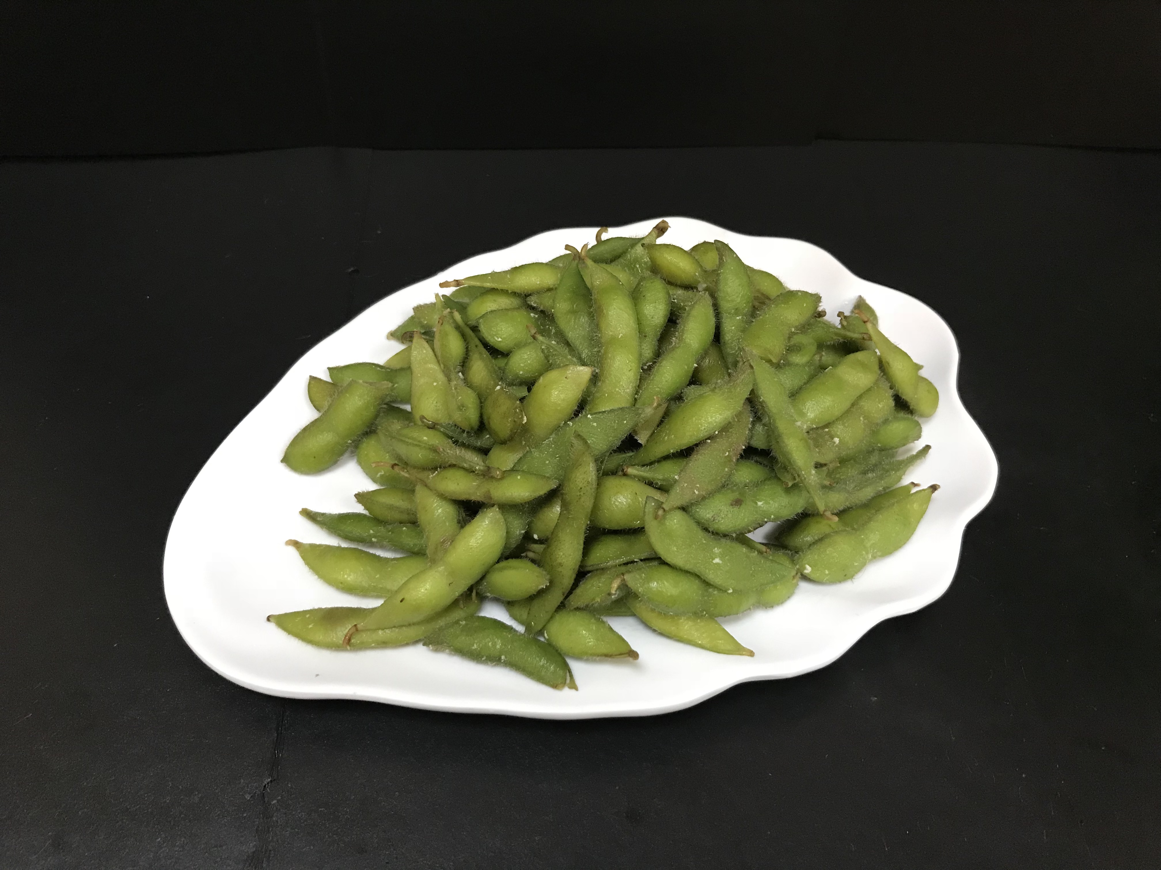 Order A6. Edamame food online from Ollie's To Go store, New York on bringmethat.com