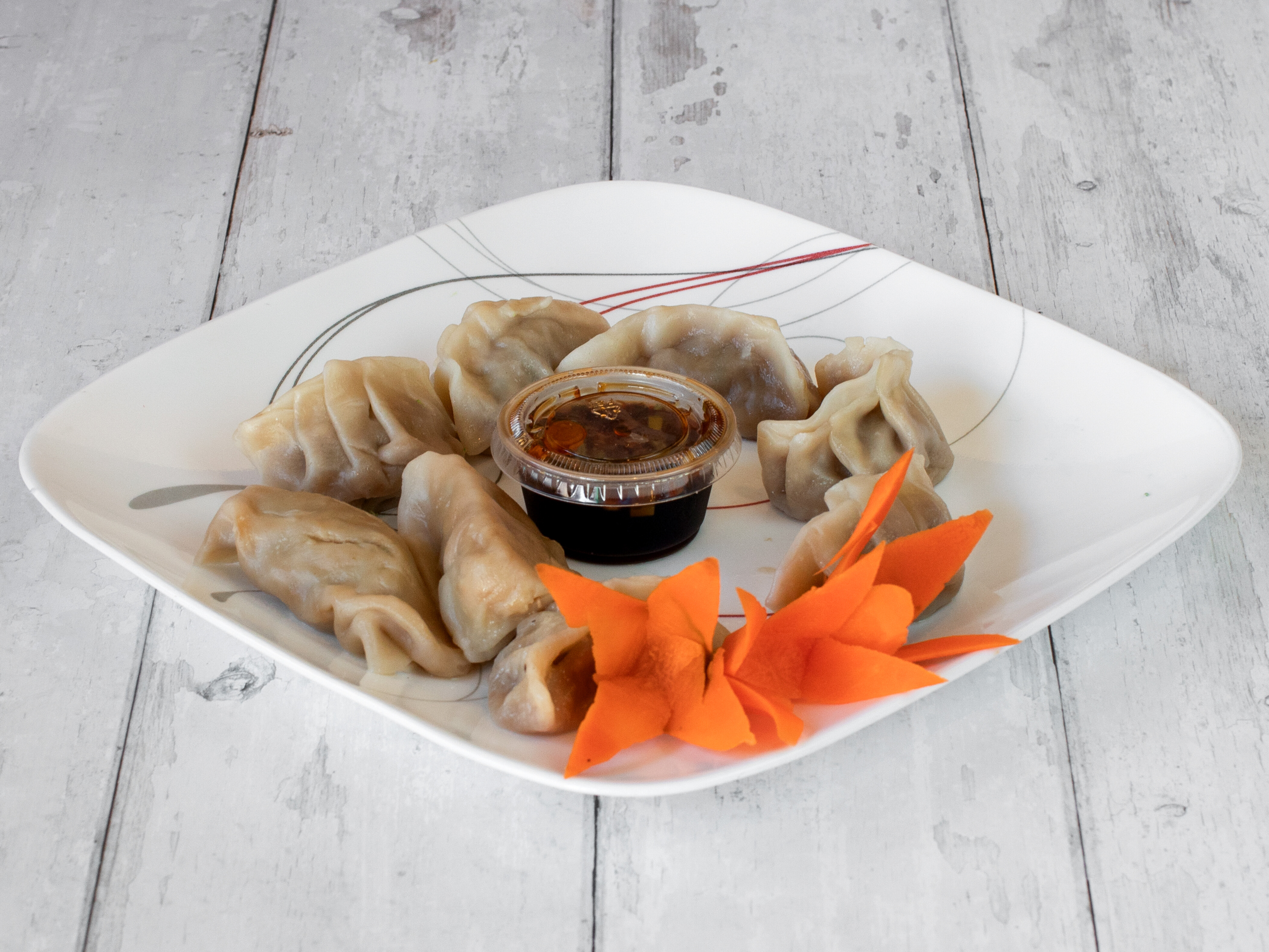Order 4. Dumplings food online from Great Dragon Express store, Dubuque on bringmethat.com