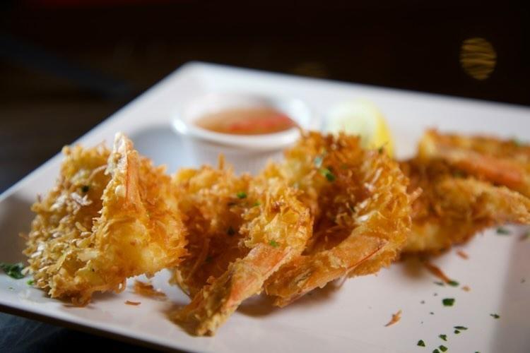 Order Coconut shrimp (Camarones al Coco) food online from Taino's Cafe store, Coram on bringmethat.com