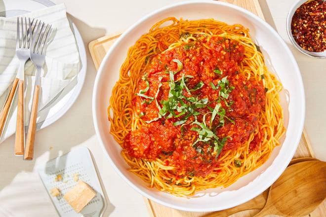 Order CATERING TOMATO BASIL SPAGHETTI food online from California Pizza Kitchen store, Long Beach on bringmethat.com