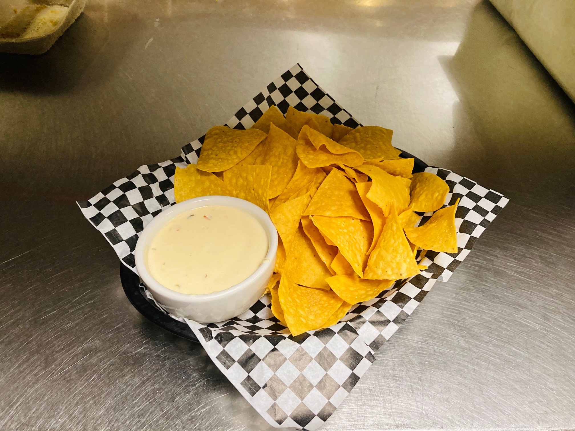 Order White Spinach Queso  food online from Saints Pub + Patio store, Independence on bringmethat.com