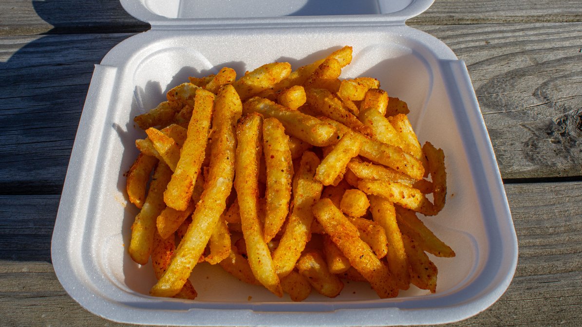 Order Medium Fries food online from Real Deal Grill store, Delaware on bringmethat.com