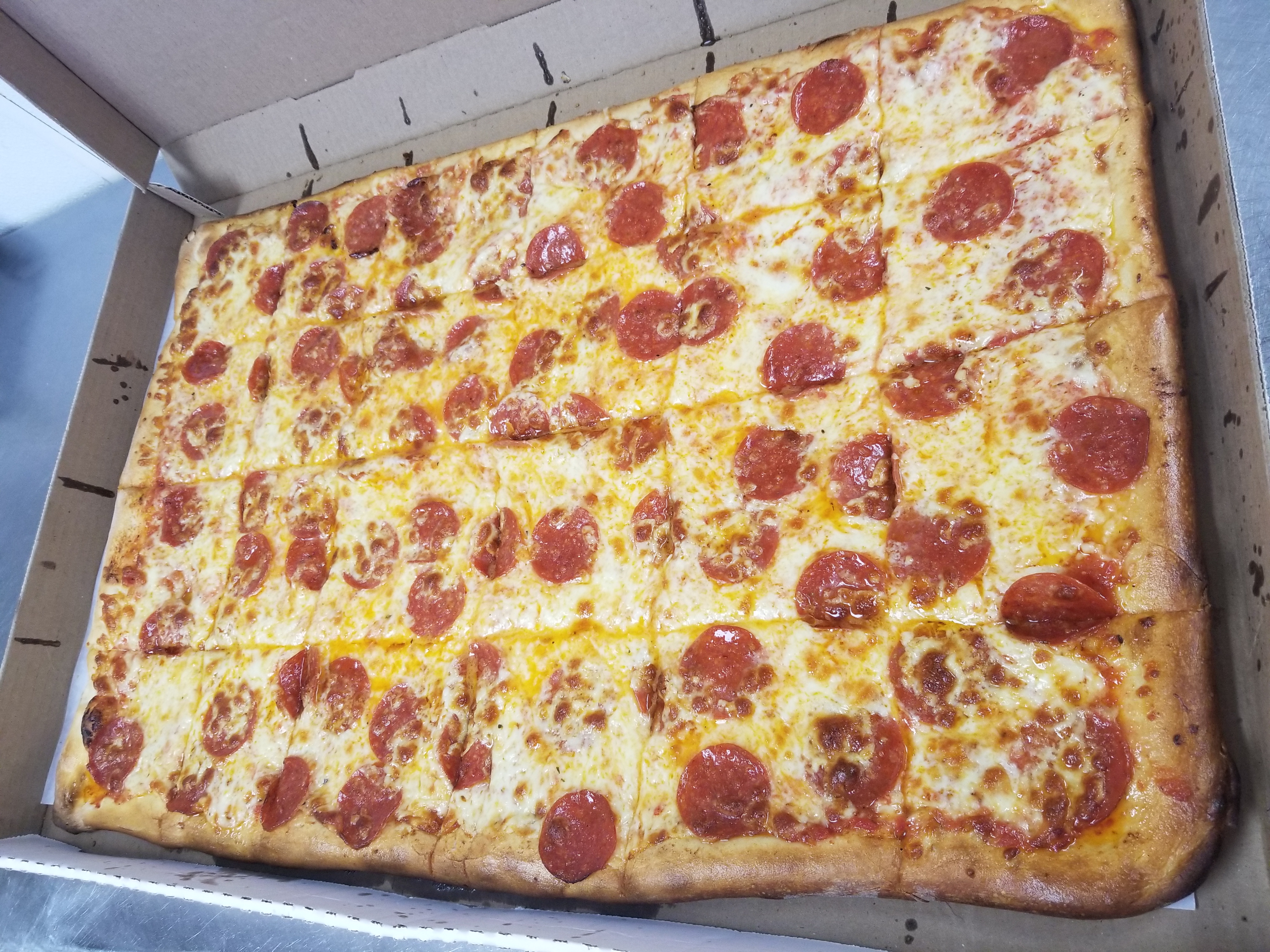 Order 4. Party Size Pizza with 2 Regular Toppings Special food online from Panaro's Pizzeria store, Bridgeport on bringmethat.com