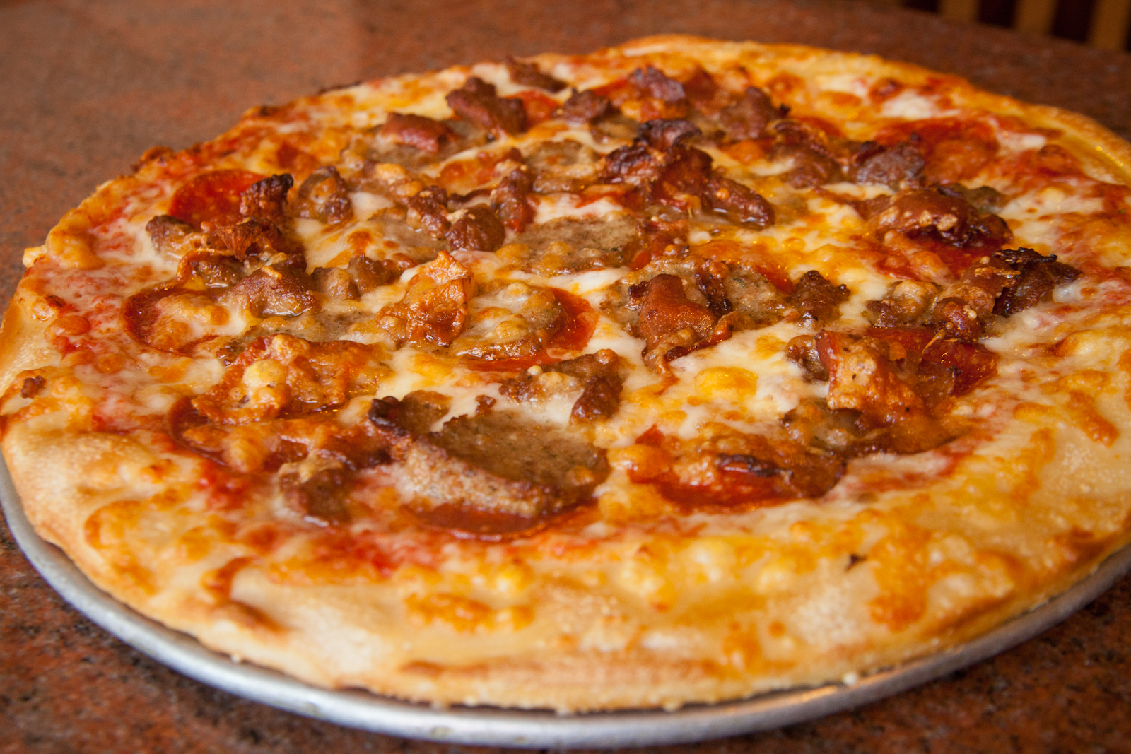 Order Meat Lovers Pizza food online from Boston Style at Merion Pizza store, Bala Cynwyd on bringmethat.com