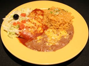 Order F. Homemade Tamale with Beef or Green Corn food online from Manuel Mexican Restaurant store, Chandler on bringmethat.com