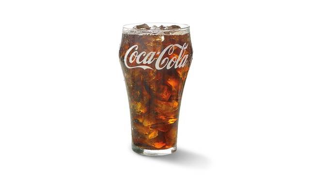 Order Coke® (30 oz.) food online from Church's Chicken store, College Park on bringmethat.com