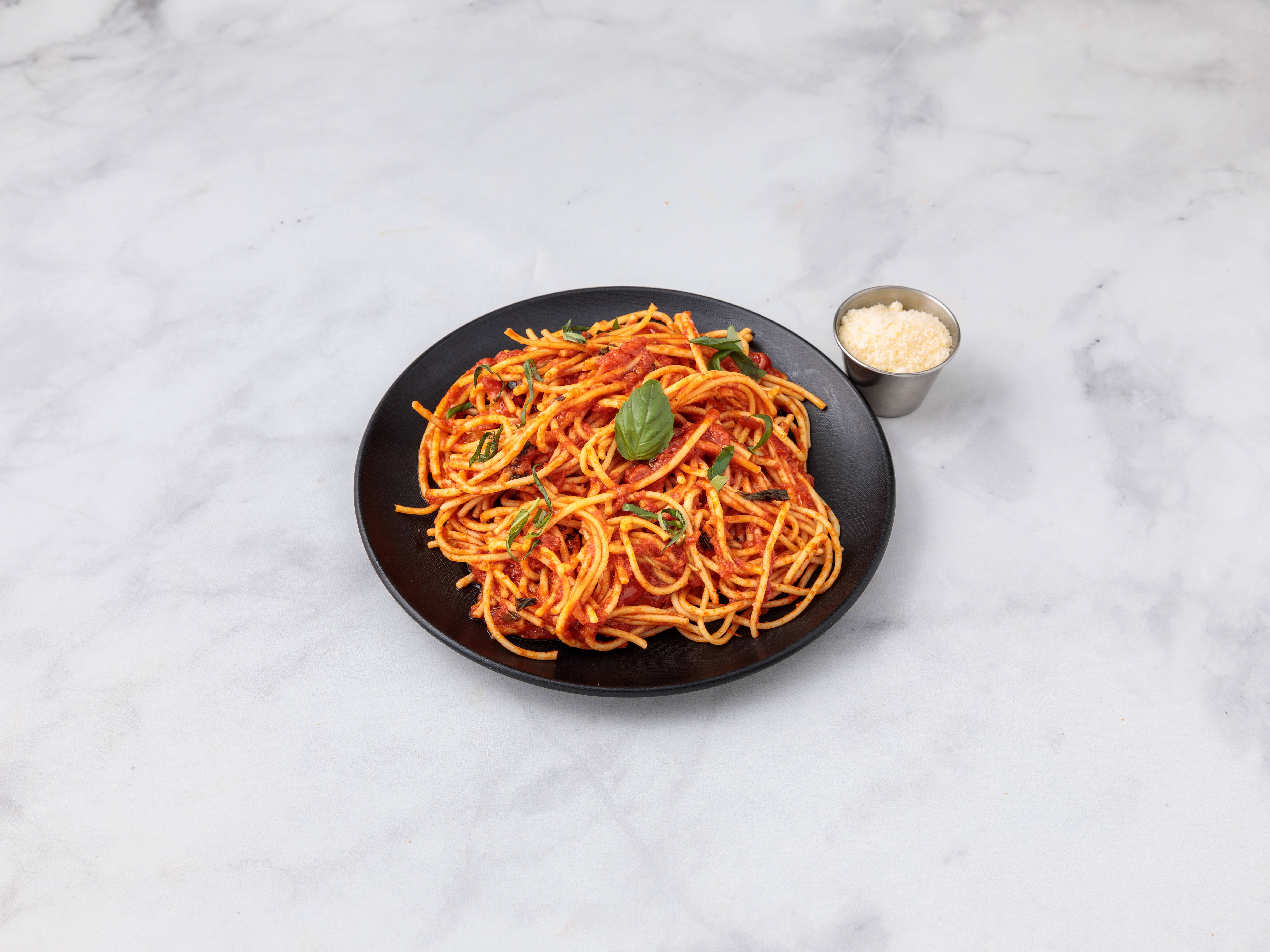 Order Spaghetti al Pomodoro food online from Ristorante Il Melograno store, New York on bringmethat.com