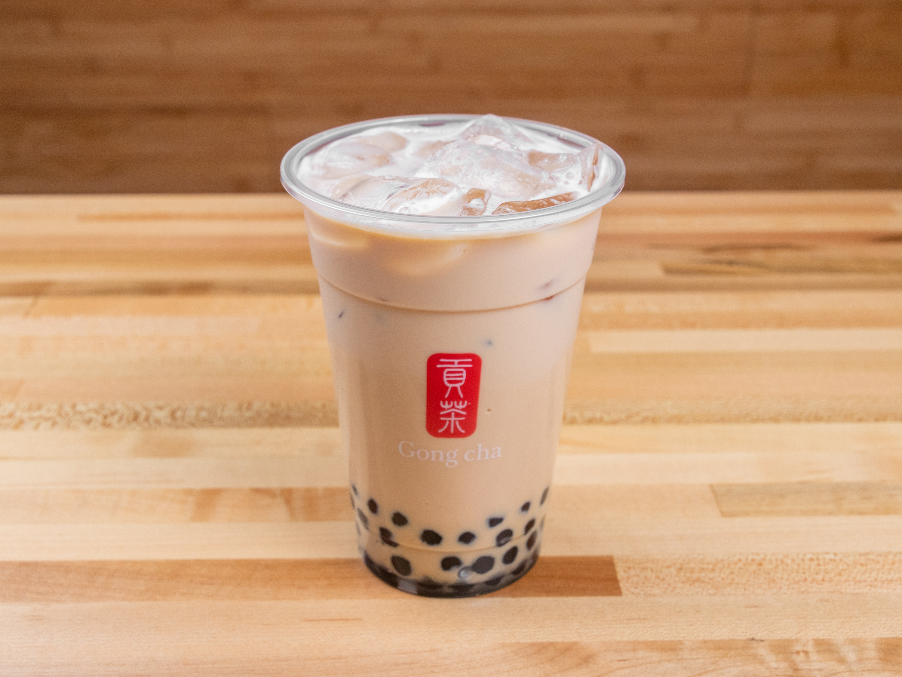 Order Cold Milk Tea with Black Pearls food online from Gongcha Suwanee store, Suwanee on bringmethat.com