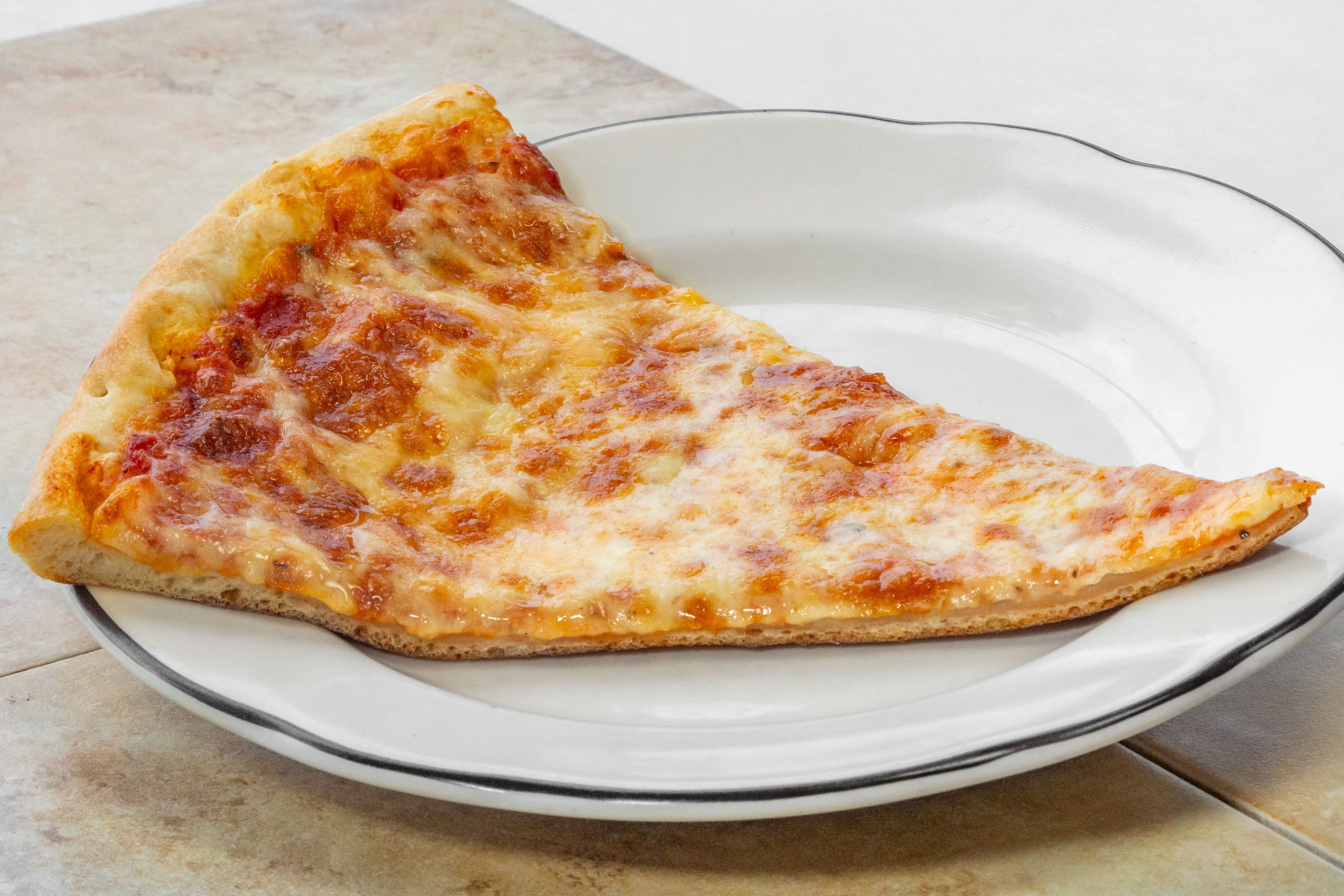 Order Cheese Pizza Slice - Slice food online from Brunos Pizza store, Gibsonia on bringmethat.com