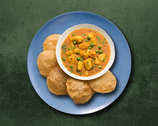 Order Aloo Puri food online from Veggie Wonderland store, Redmond on bringmethat.com