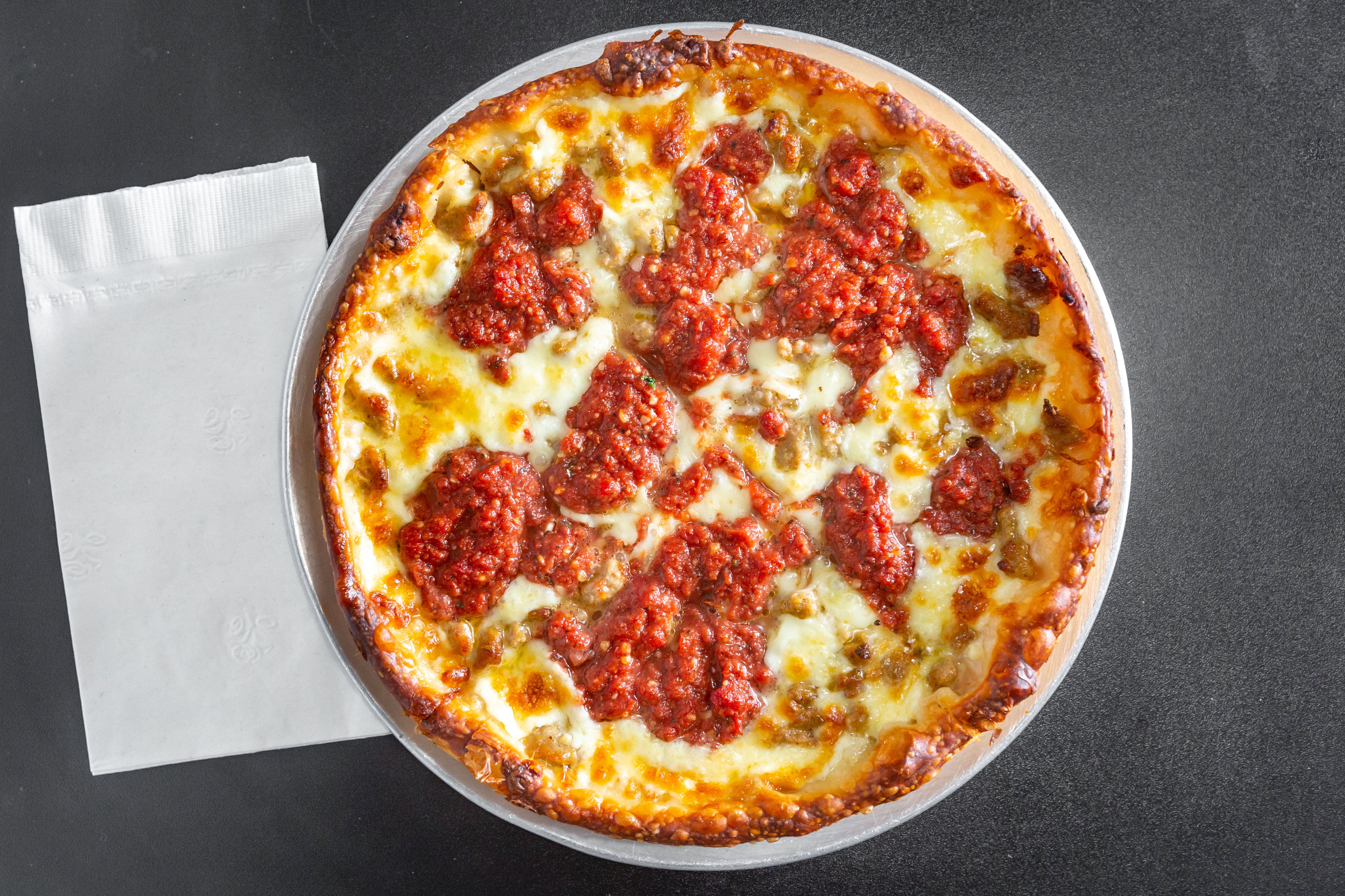 Order Chicago Classic Deep Dish Pizza - Small 10'' food online from Tangy Tomato store, Syracuse on bringmethat.com