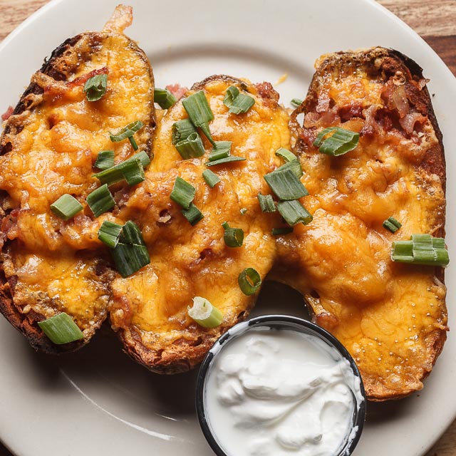Order Touch Down Tater Skins food online from Big Mike's Sports Bar & Grill store, Denham Springs on bringmethat.com