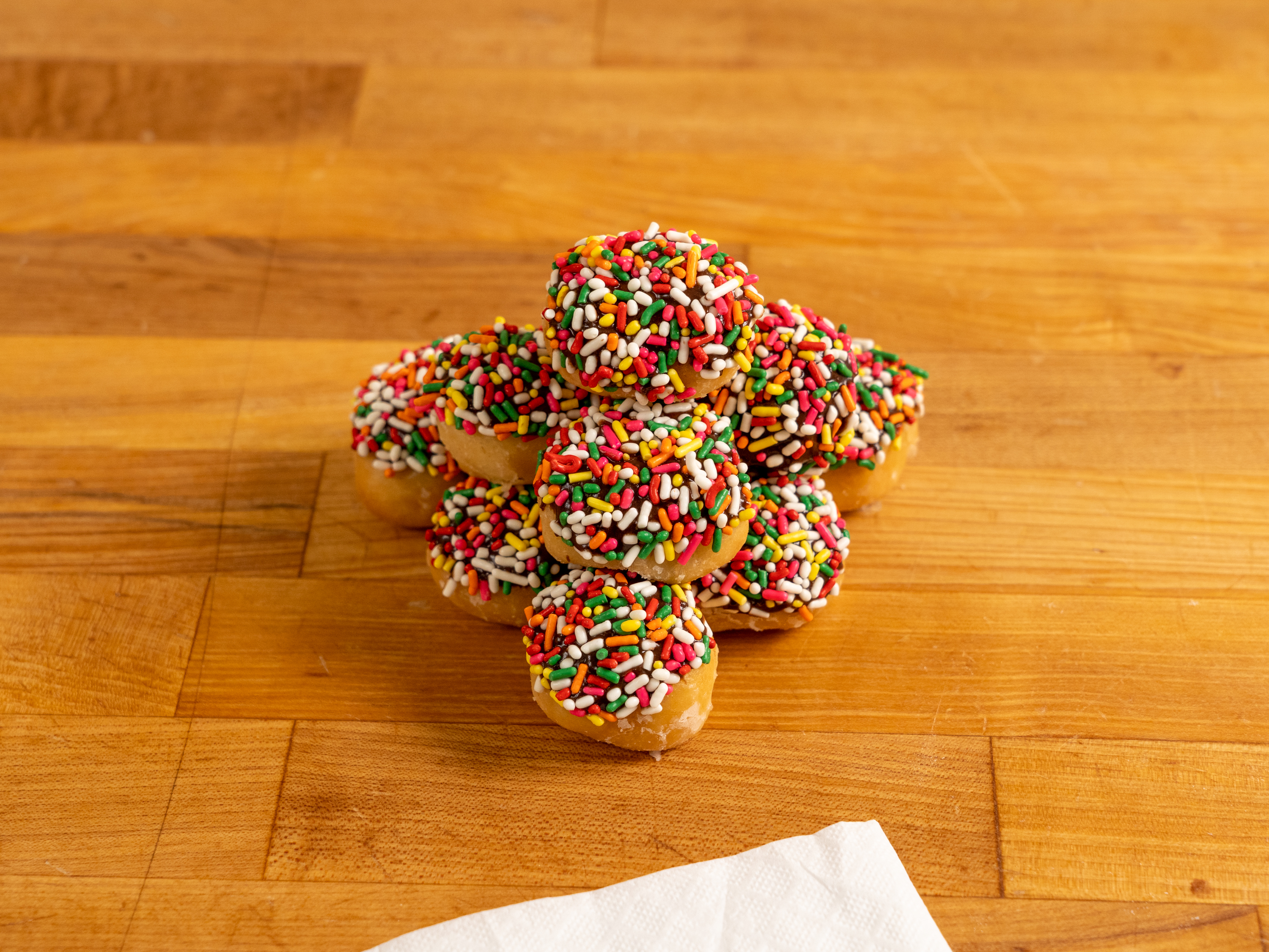 Order Sprinkle Donut Hole food online from Lakewood Donut store, Dallas on bringmethat.com