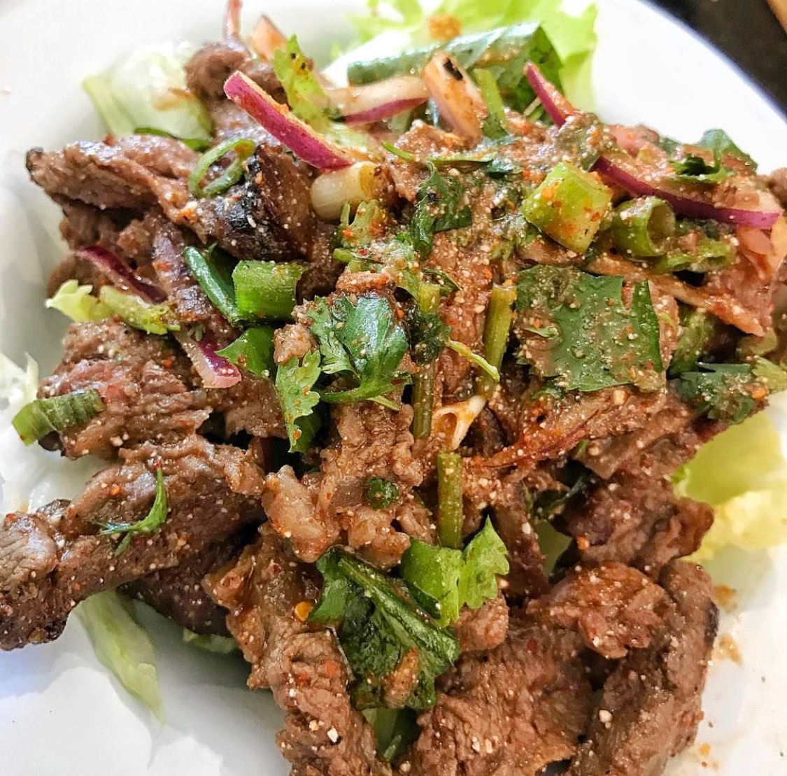 Order Grilled Beef Nam Tok with Sticky Rice food online from Chim! Thai Street Food store, Pasadena on bringmethat.com
