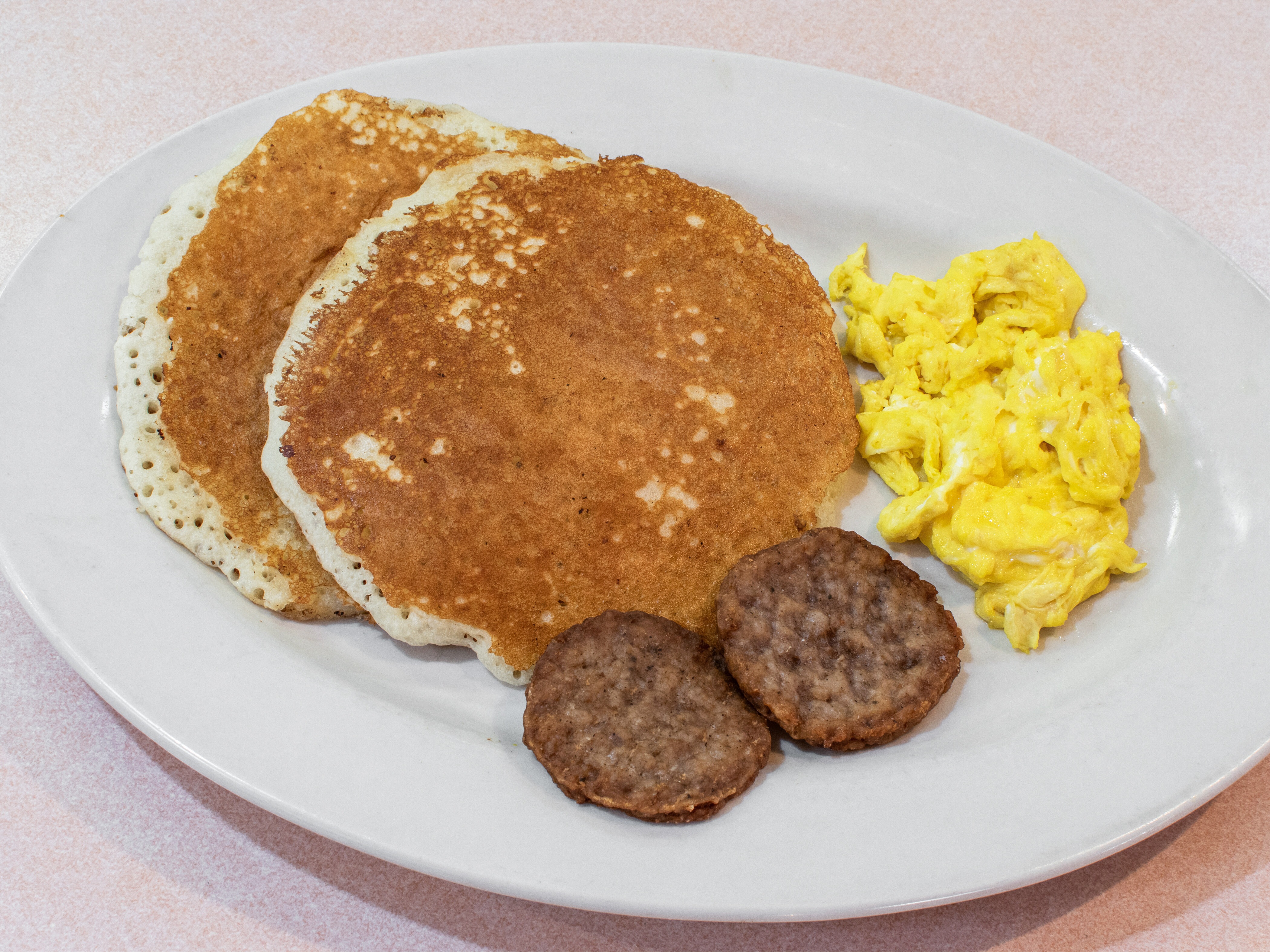 Order 8. Pancake and Eggs Breakfast Special food online from Paul Restaurant store, Halethorpe on bringmethat.com