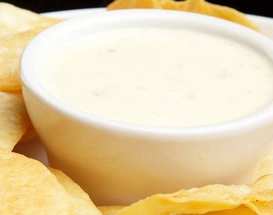 Order Chips and Queso food online from Tacos Y Mas - Dallas store, Dallas on bringmethat.com