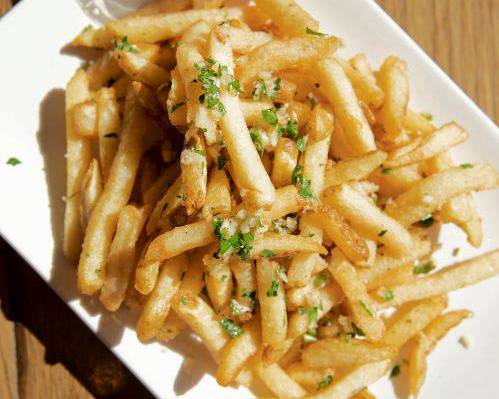 Order Garlic Fries food online from Regents Pizzeria store, San Diego on bringmethat.com