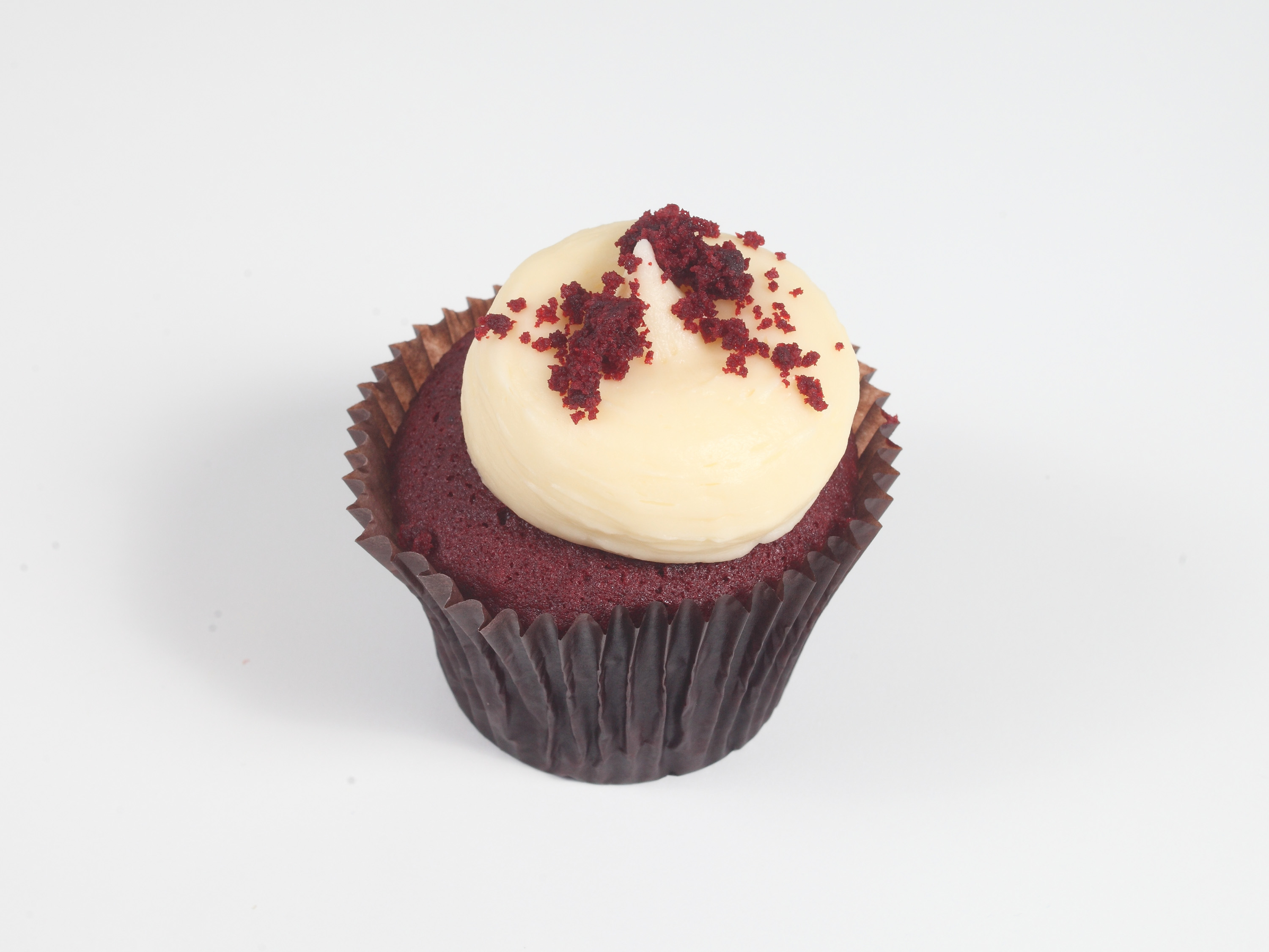 Order "Famous" Red Velvet Cupcake food online from Smallcakes Steele Creek store, Charlotte on bringmethat.com