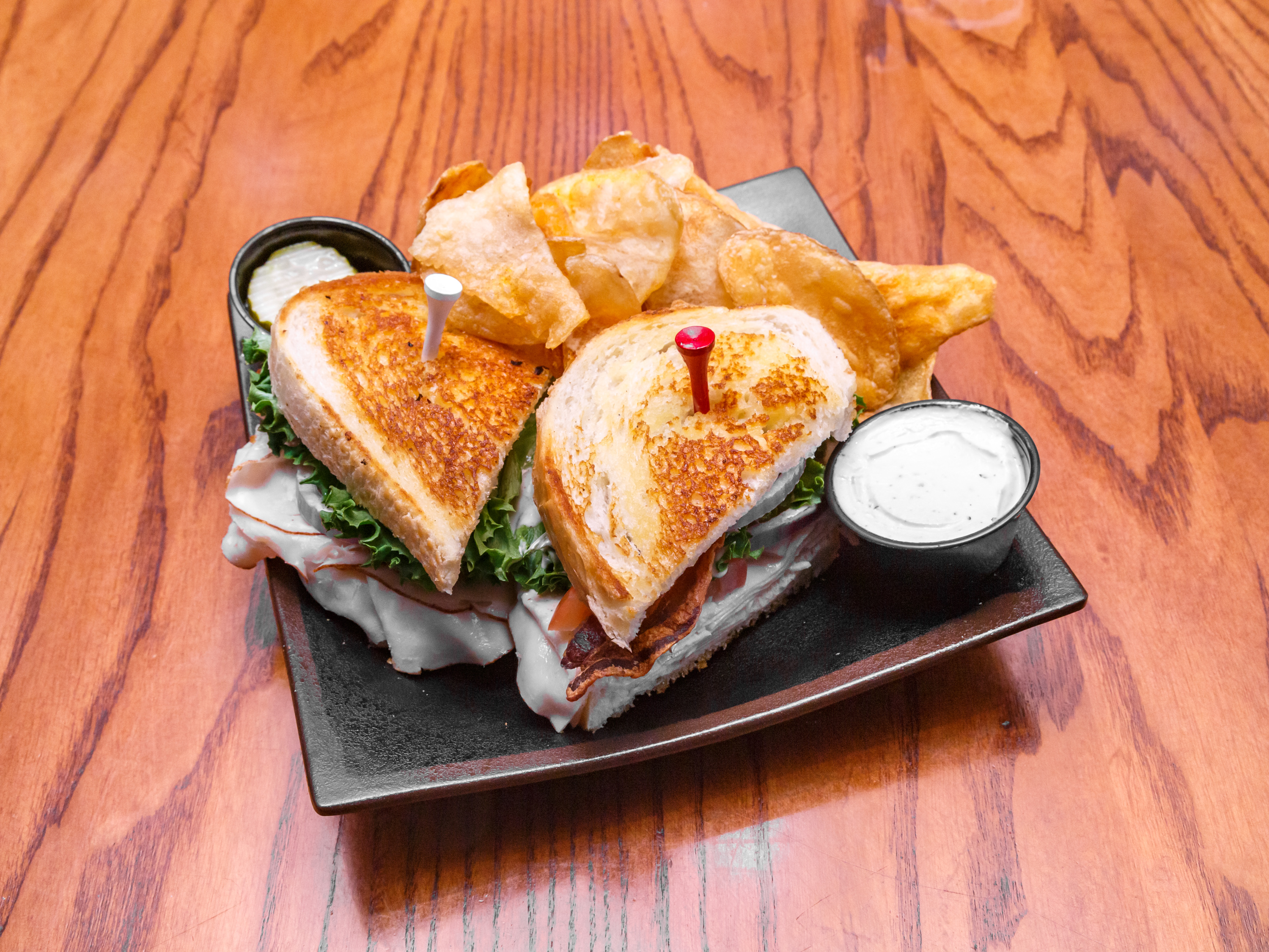 Order Roasted Ranch Turkey Club Sandwich food online from The Sports Grille At Cranberry store, Cranberry Township on bringmethat.com