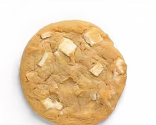 Order White Chocolate Macadamia Nut Cookie - Otis Spunkmeyer food online from Extra Mile 2001 store, Cypress on bringmethat.com