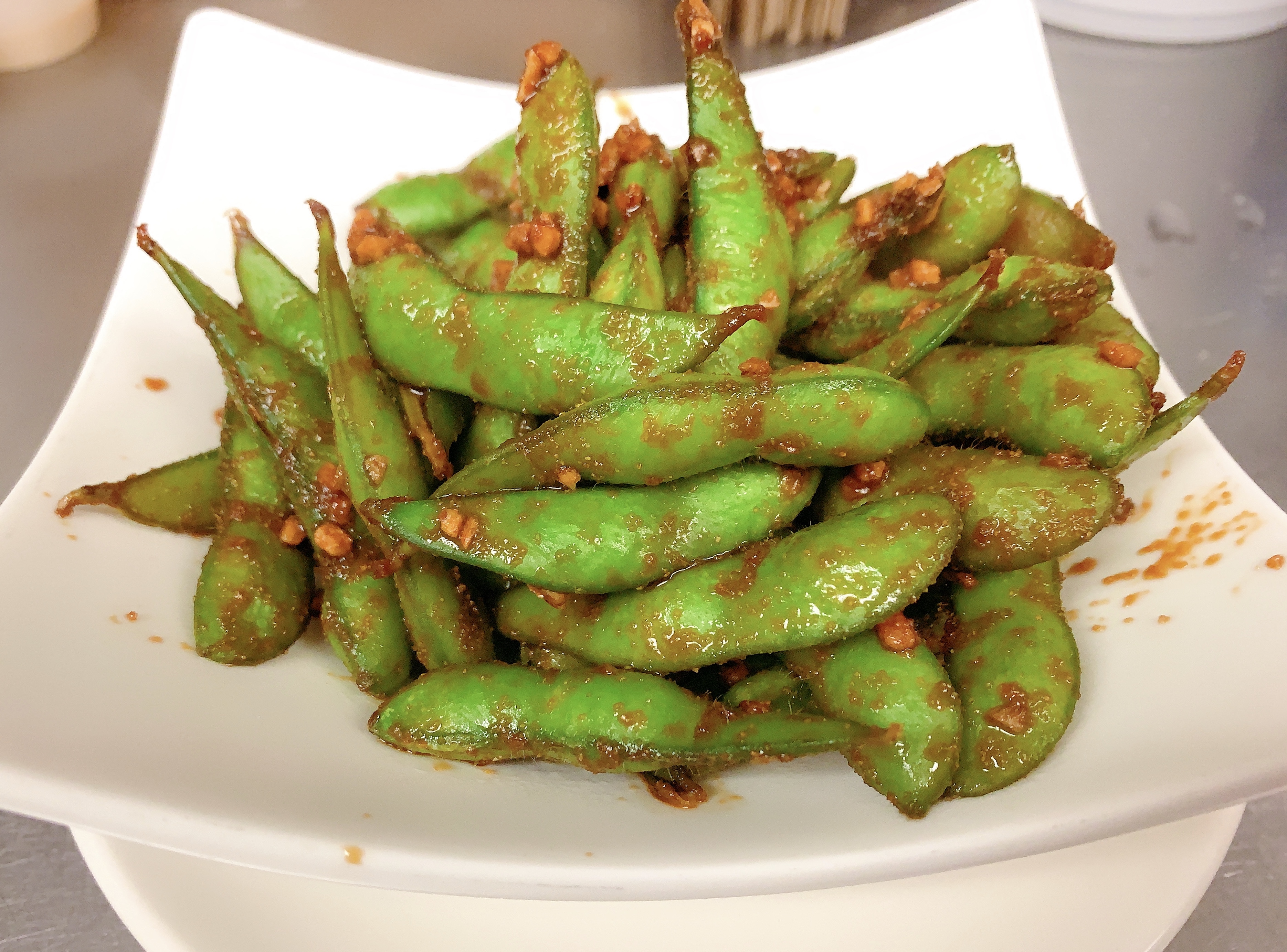 Order Garlic Edamame food online from Blue Wazabi store, Madison on bringmethat.com