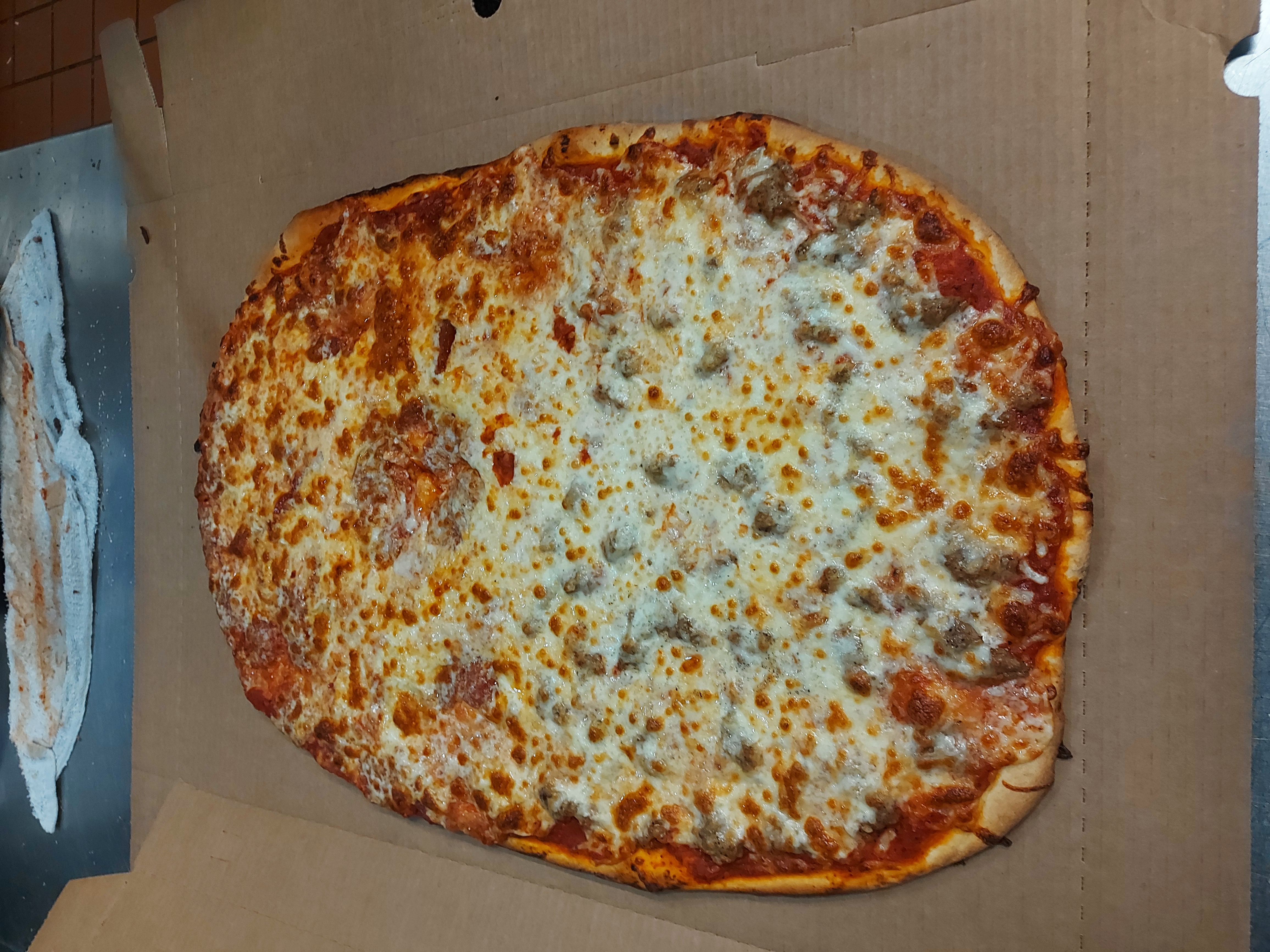 Order Thin Crust Cheese Pizza food online from Village Pizza store, Chicago on bringmethat.com