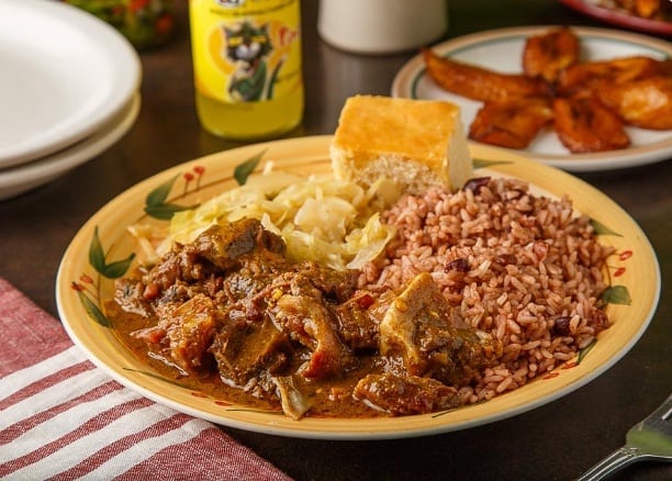 Order Curry Goat food online from Little Jamaican Restaurant store, Albany on bringmethat.com