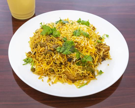 Order Vegetable Biryani food online from Sri Ganesh Dosa House store, Parsippany-Troy Hills on bringmethat.com