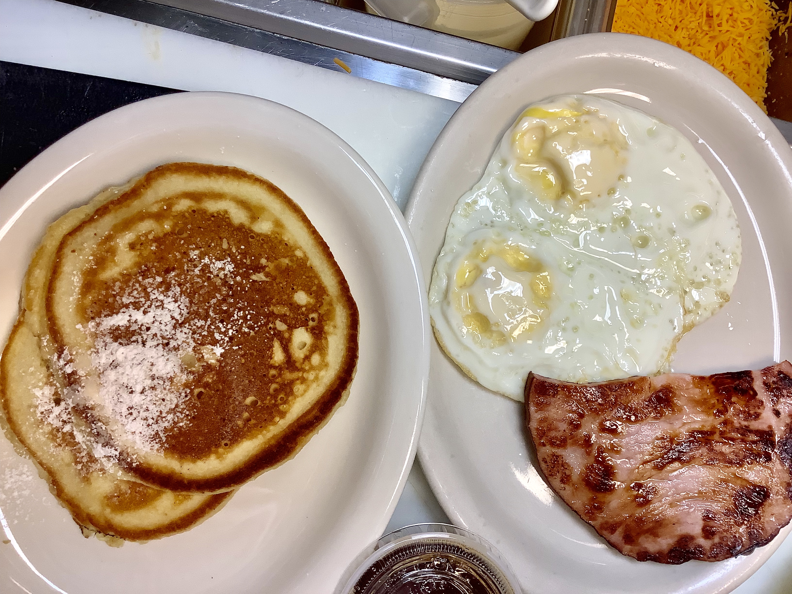Order 2 Pancakes+ 2 Eggs + Meat food online from Extra Perks store, Alexandria on bringmethat.com