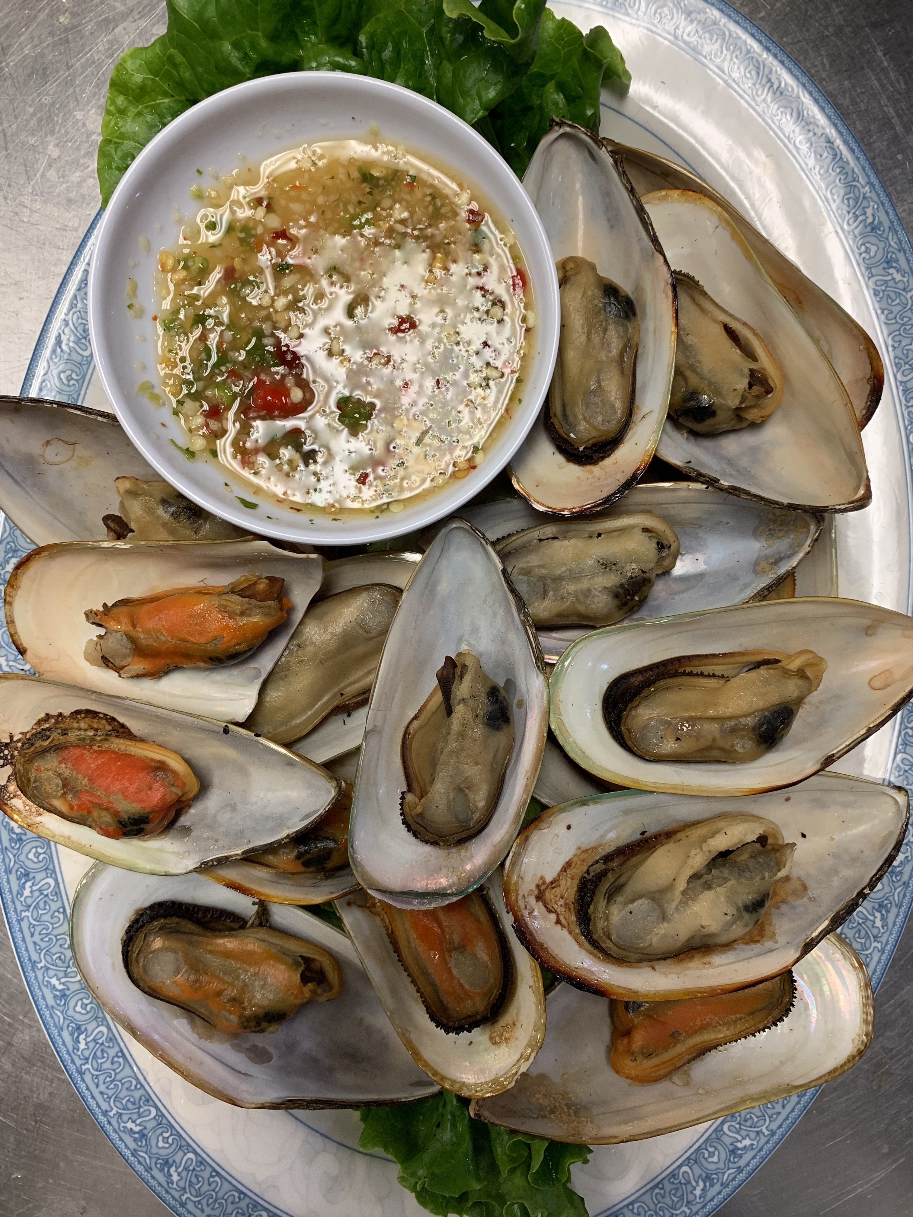 Order Grilled Mussel food online from Cajun Seafood House store, Los Angeles on bringmethat.com