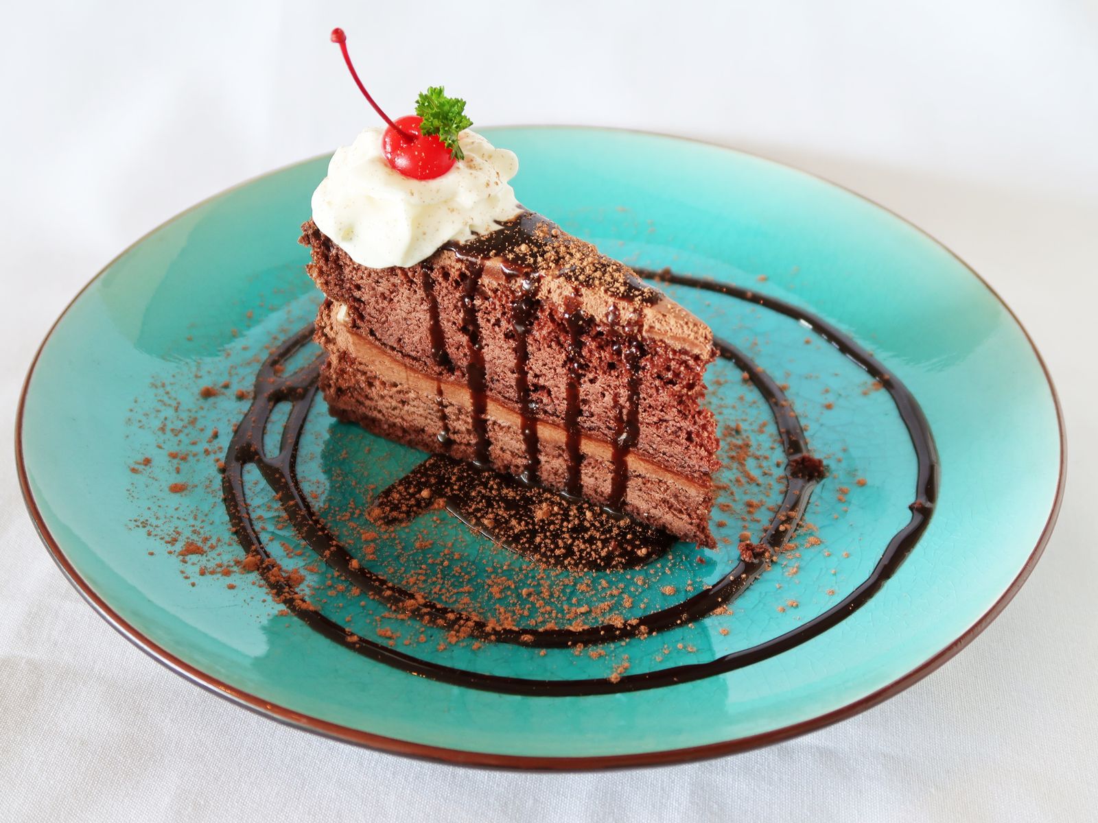 Order CHOCOLATE MOOSE CAKE food online from Pinto Urban Thai Diner store, Richardson on bringmethat.com