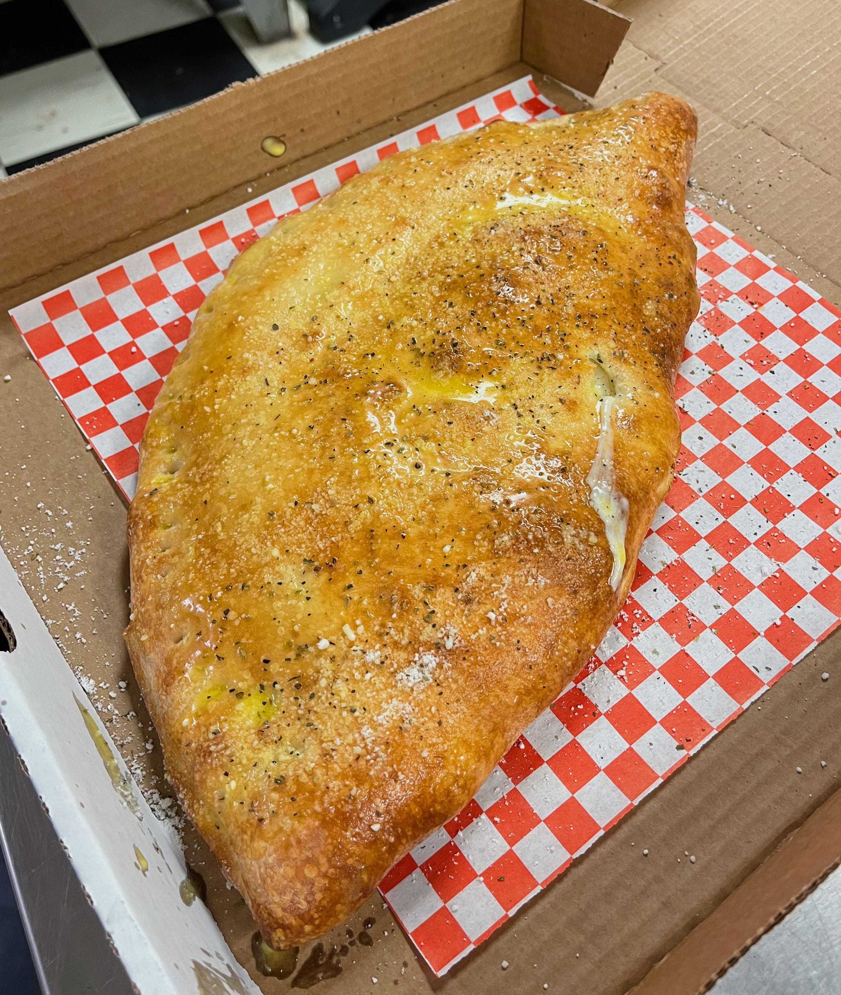 Order Chicken Garlic Calzone - Calzone food online from Pizza Nation store, Las Vegas on bringmethat.com
