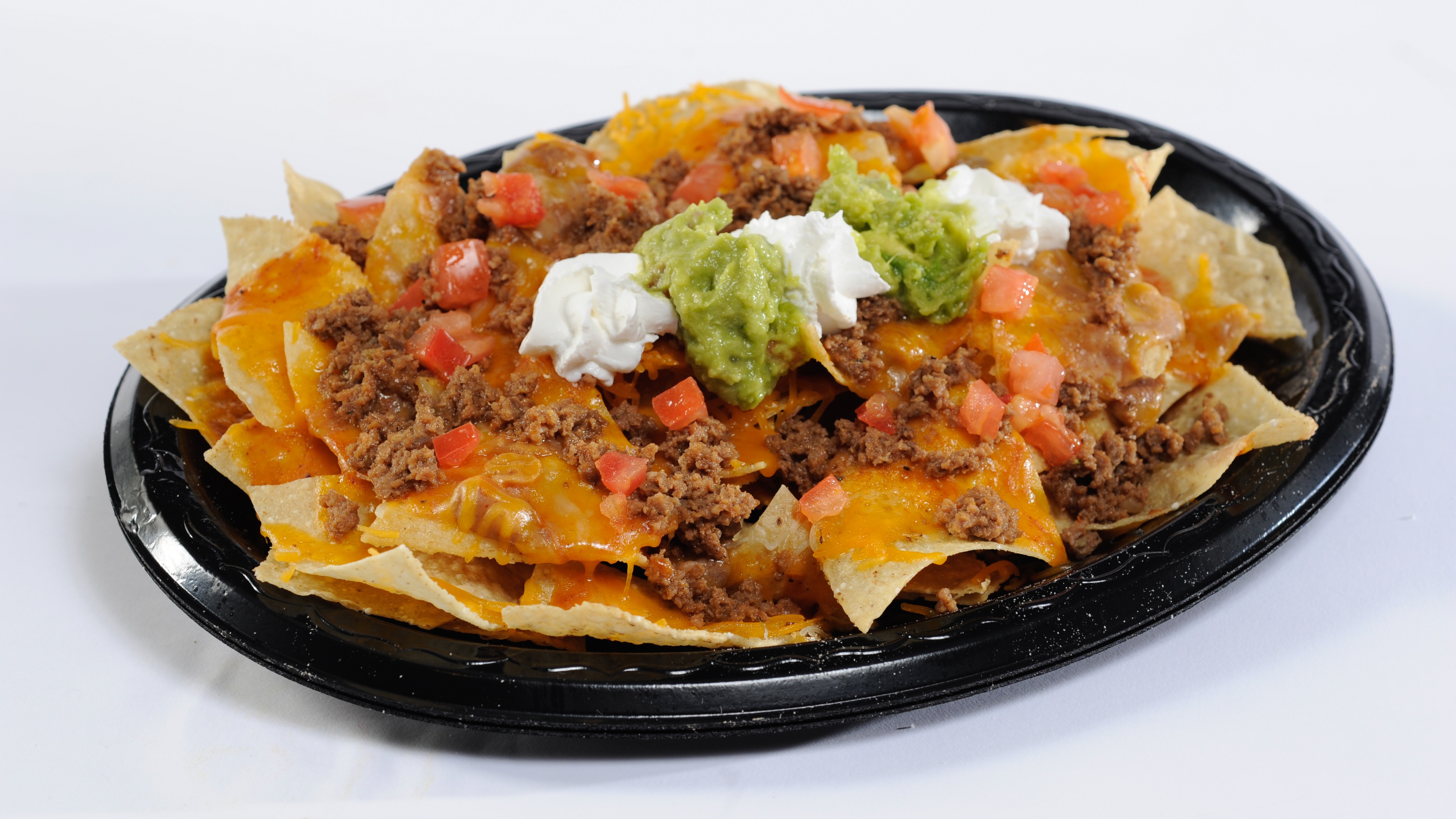 Order Meat Nacho food online from Amigos/Kings Classic store, Lincoln on bringmethat.com