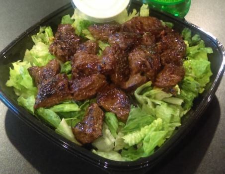Order Steak Tip Salad food online from Jimmys Famous Pizza store, North Andover on bringmethat.com